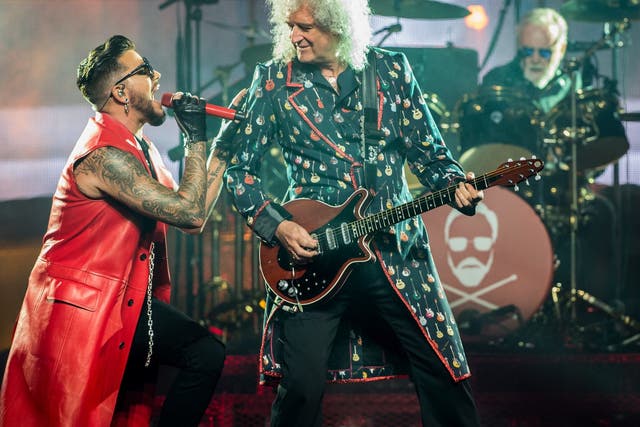 Adam Lambert performs with Brian May and Roger Taylor at The O2 Arena