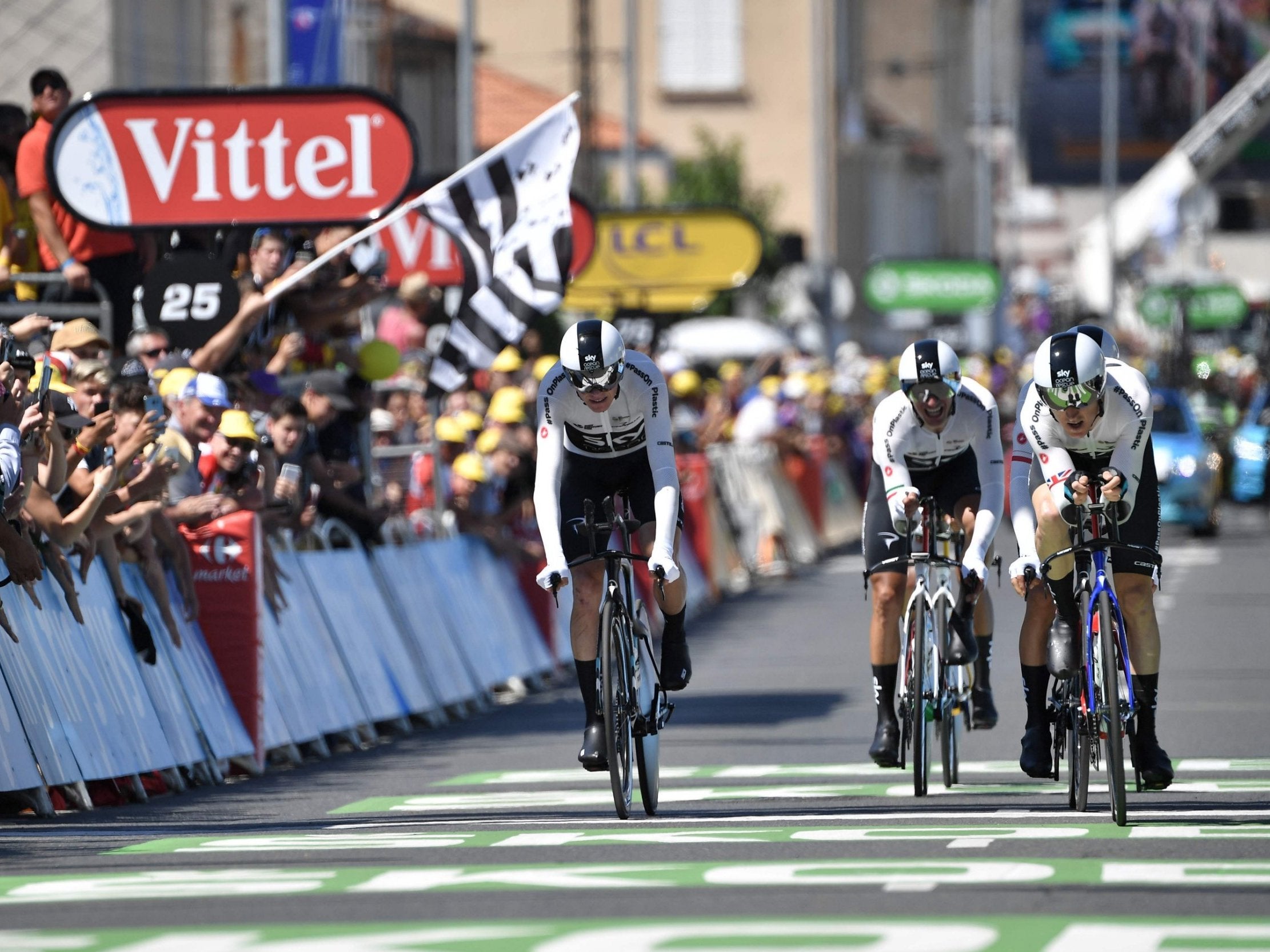 Team Sky cross the line at the end of the team time trial