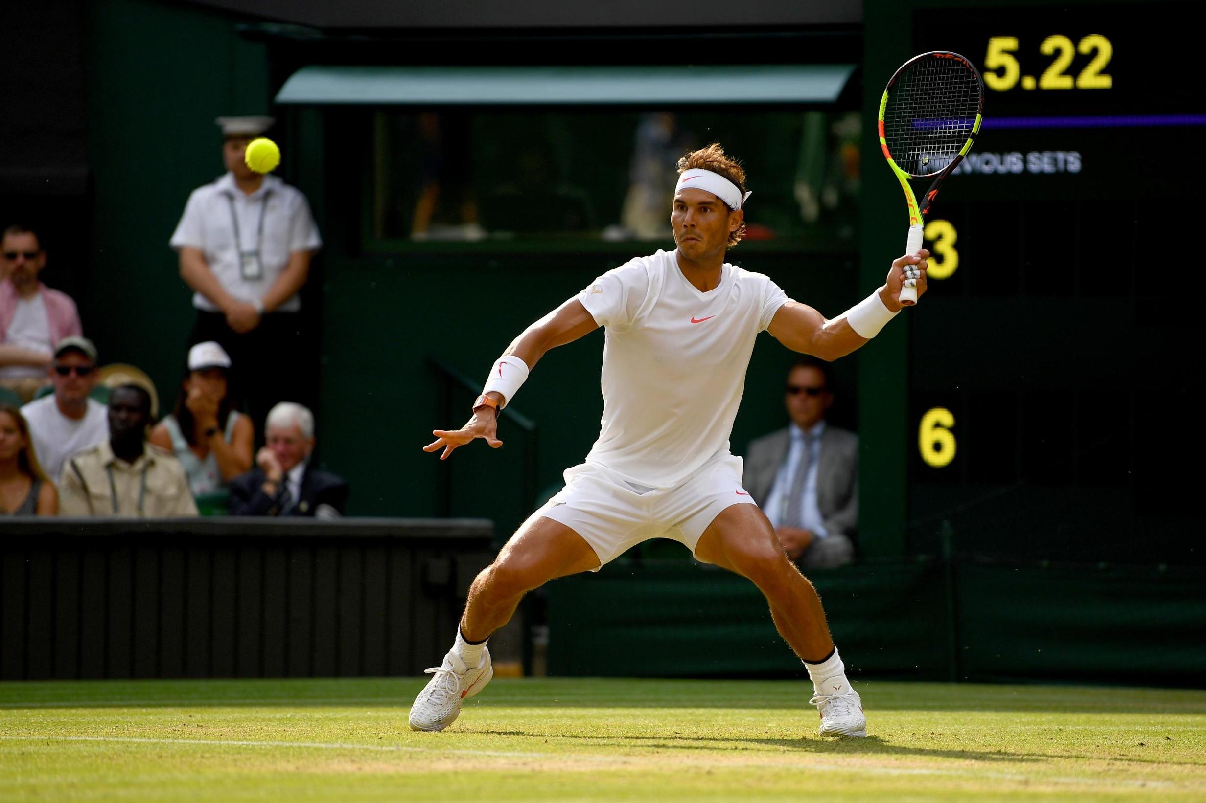 Rafael Nadal and Roger Federer remain on course to meet in the final