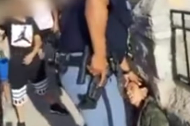 A police officer was filmed pointing a gun at a group of children in El Paso, Texas