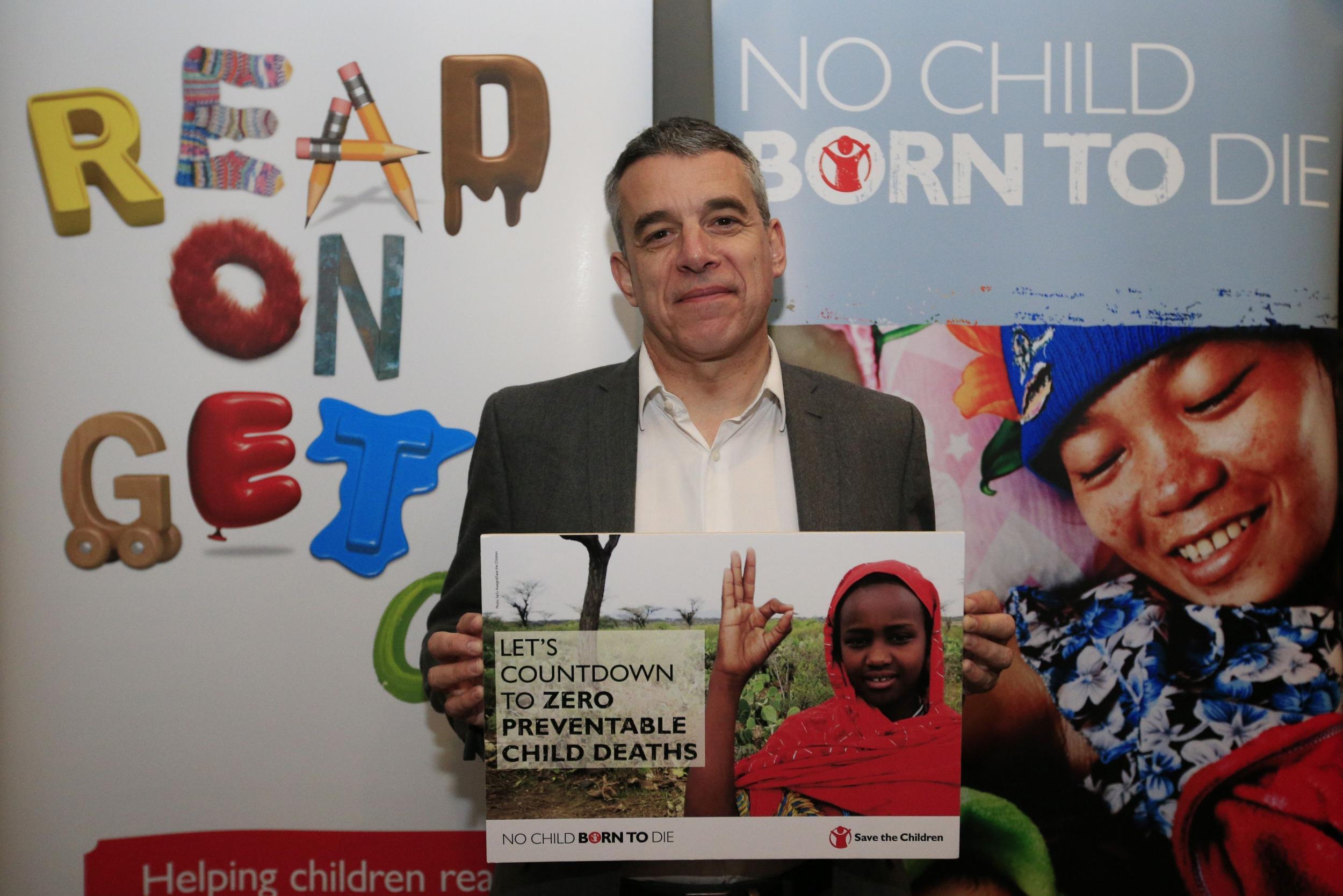 Jeff Smith holds up a message board at a Save the Children event in 2015. Jonathan Brady/PA Images