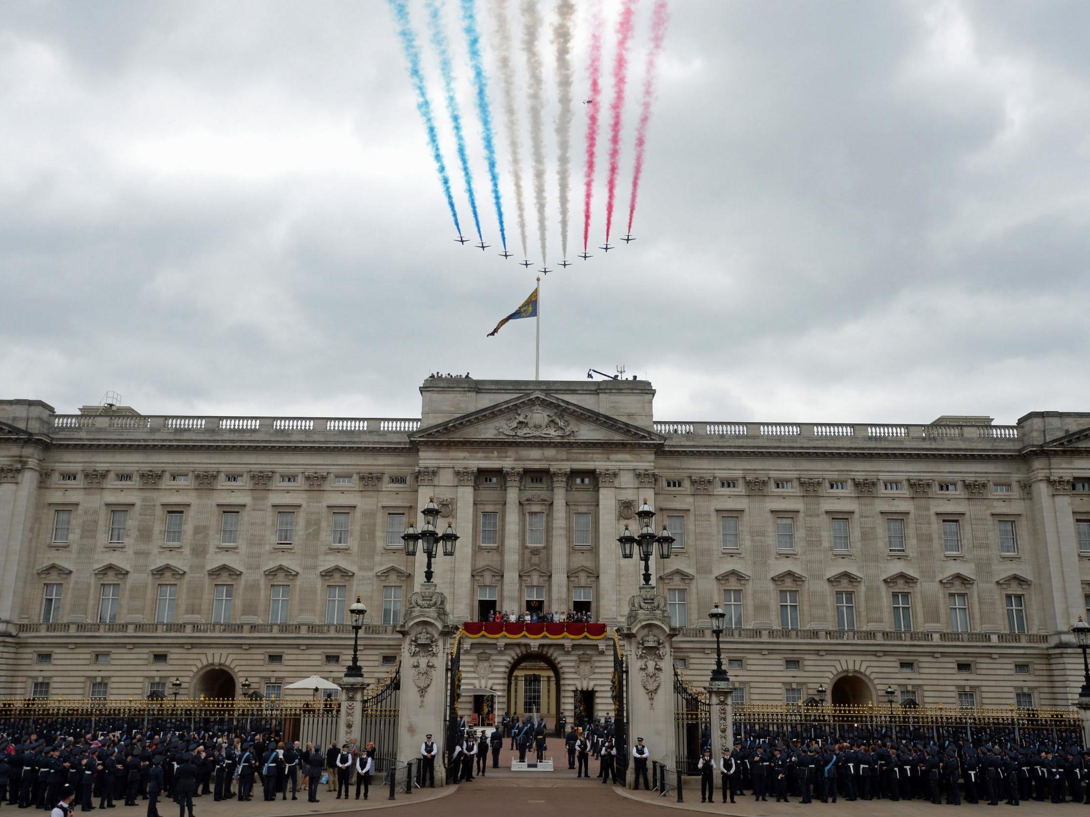 RAF aircraft fly in formation over Buckingham Palace in London to mark the centenary of the Royal Air Force