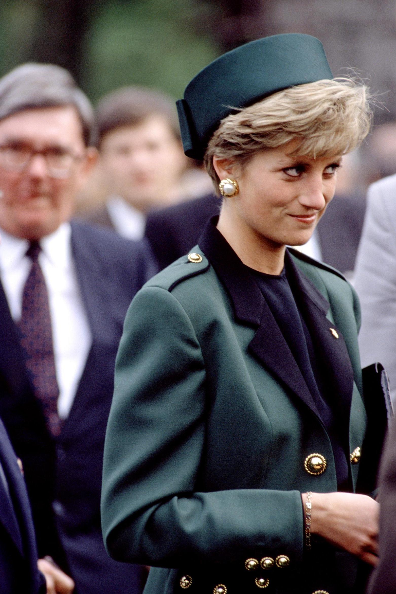 The late Princess Diana wore an olive green military-style suit on an official visit to Czechoslovakia in 1991.