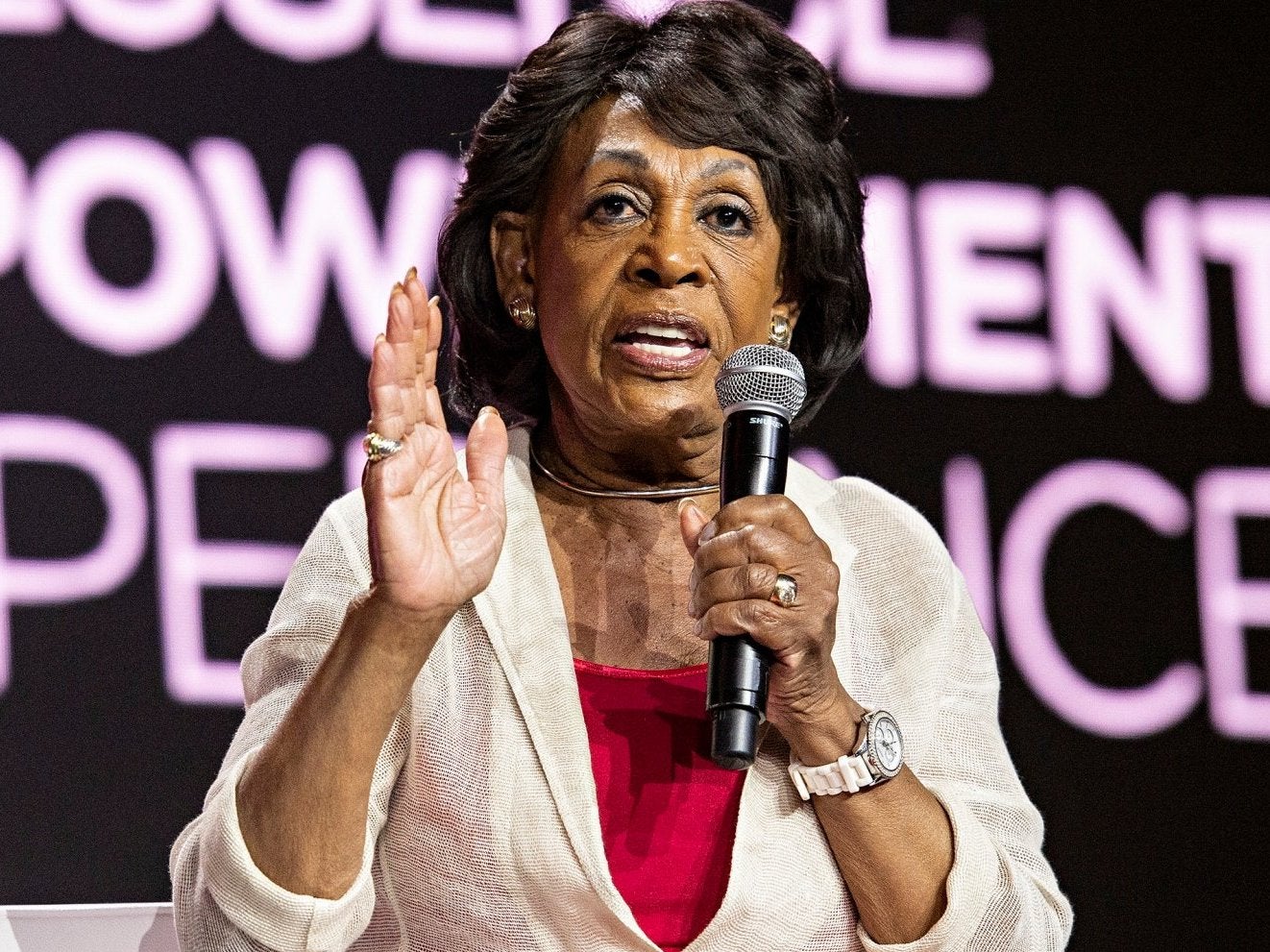 Maxine Waters at a rally in California