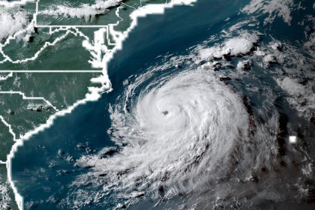 A satellite image shows the incoming storm just off the US east coast