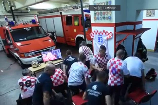 Croatian firefighters spring into action seconds before Ivan Rakitic's match-winning penalty