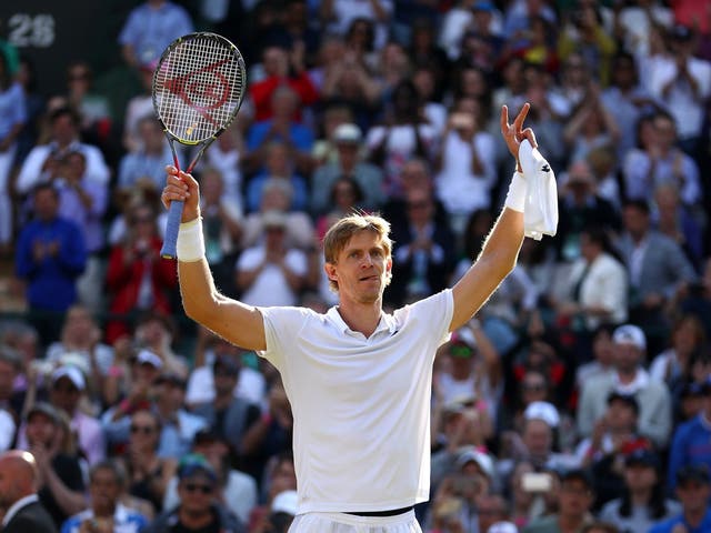 Kevin Anderson celebrates his victory over Roger Federer in the Wimbledon quarter-finals