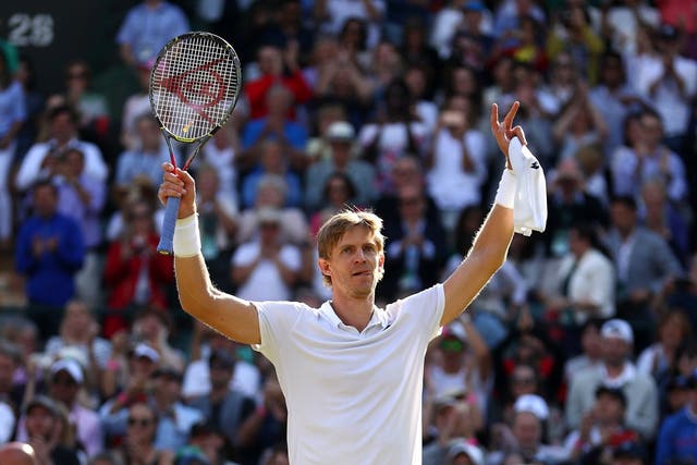 Kevin Anderson celebrates his victory over Roger Federer in the Wimbledon quarter-finals