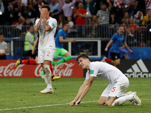 England's John Stones and Kyle Walker react after conceding their second goal scored by Croatia's Mario Mandzukic
