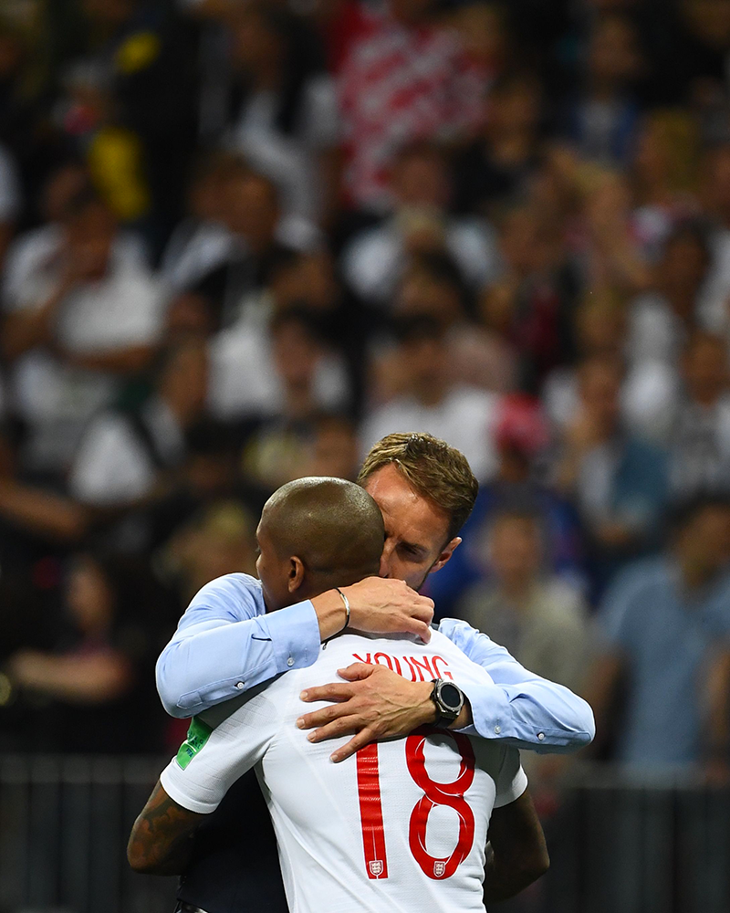 Gareth Southgate consoles Ashley Young after the final whistle