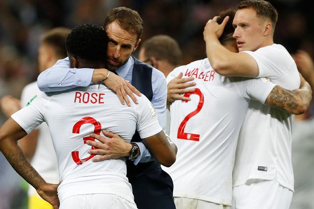 England head coach Gareth Southgate comforts England's Danny Rose
