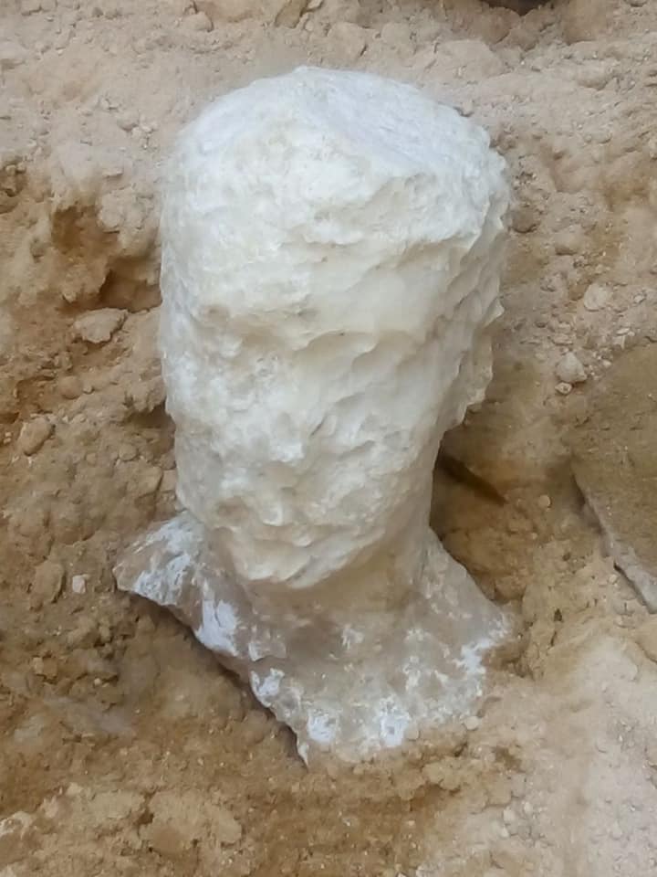 This carved alabaster head was found near the sarcophagus