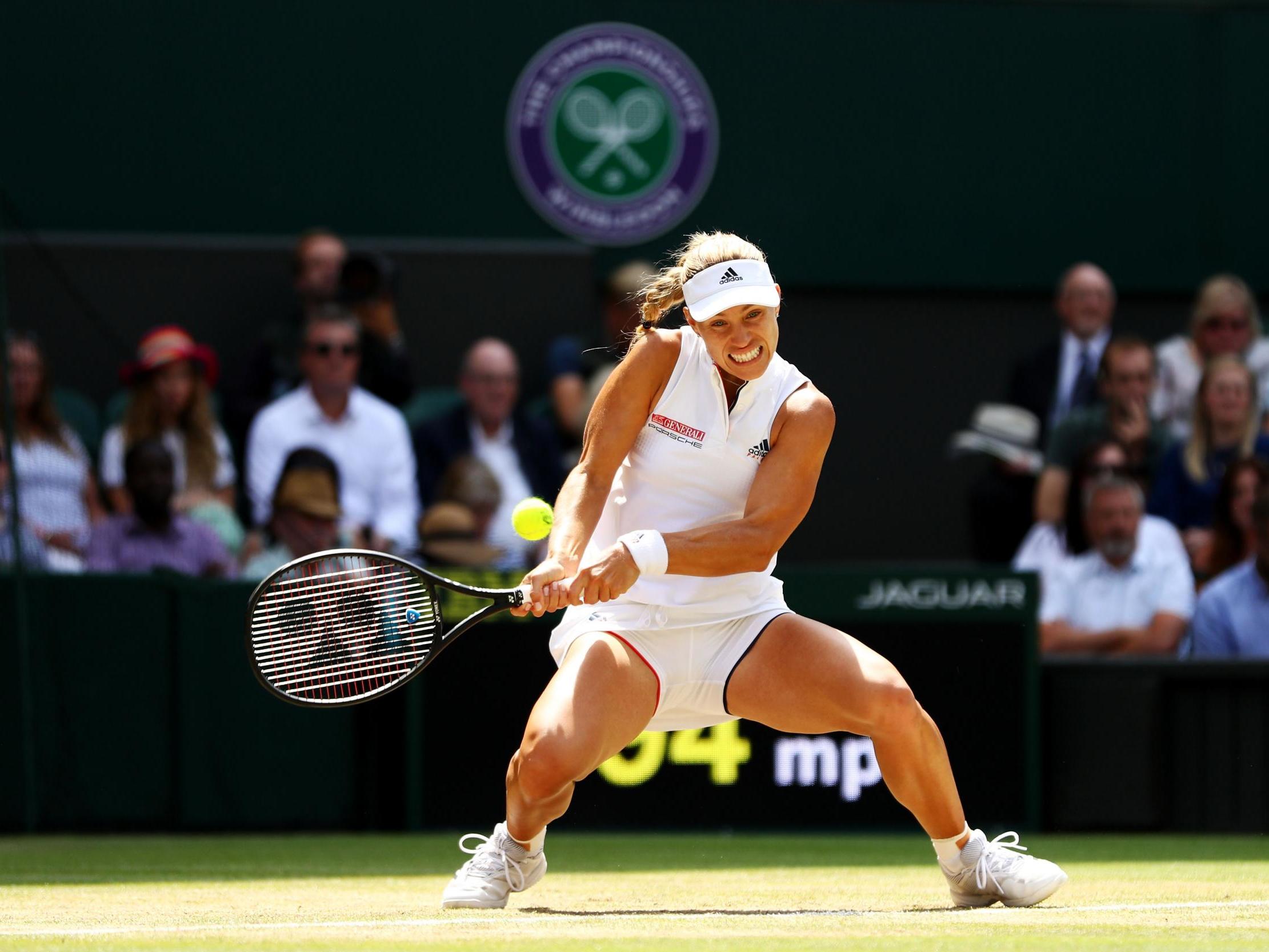 Kerber gets down low to make a backhand shot