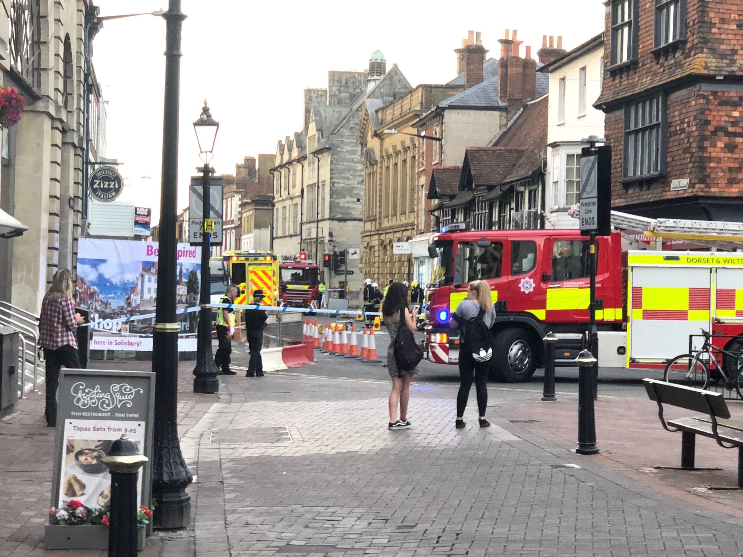 Police in Salisbury cordoned off a section of road near the Zizzi restaurant after a man was found in the street