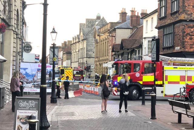 Police in Salisbury cordoned off a section of road near the Zizzi restaurant after a man was found in the street