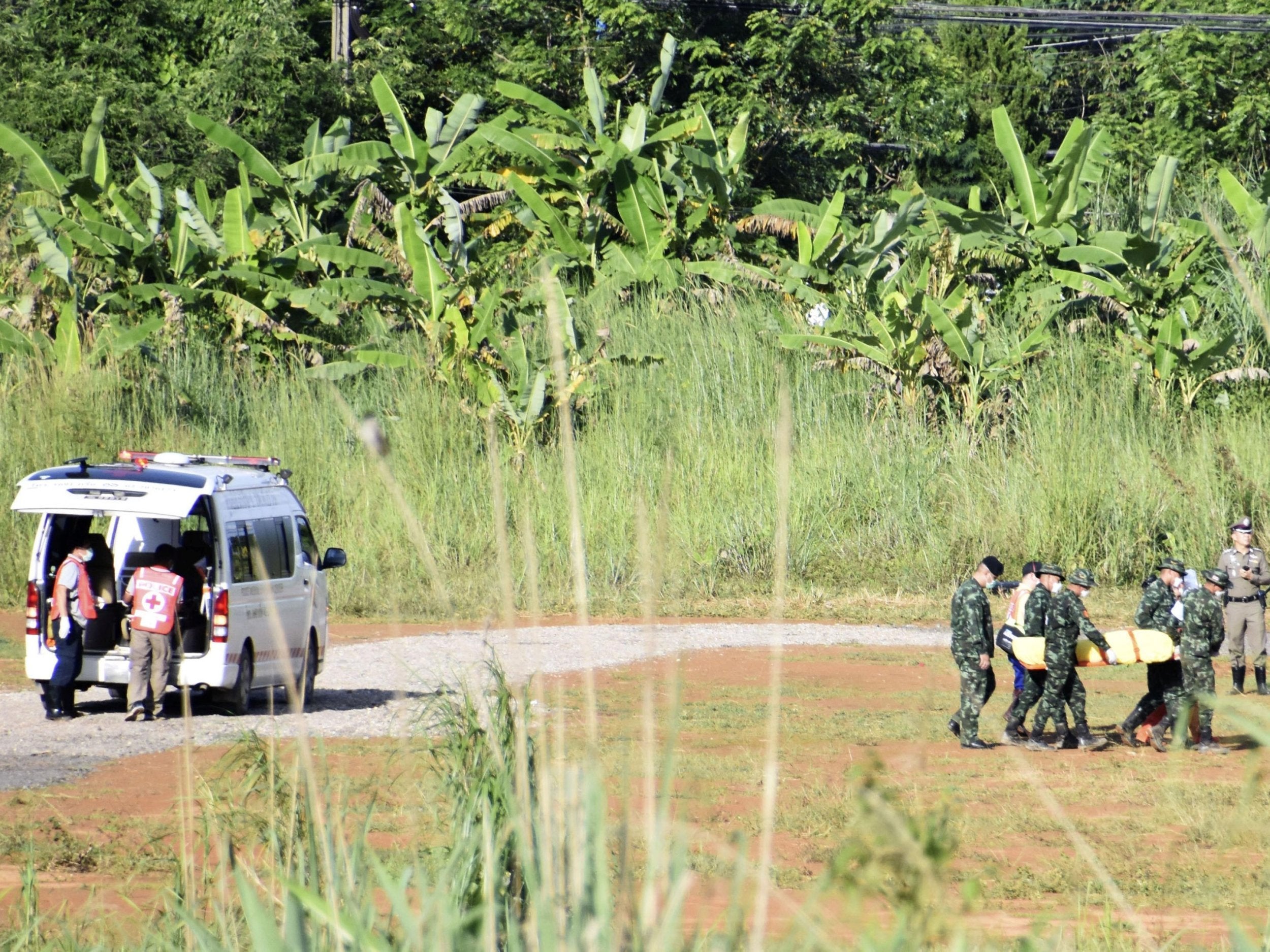 A rescued boy is stretchered to an ambulance on Tuesday (Reuters)