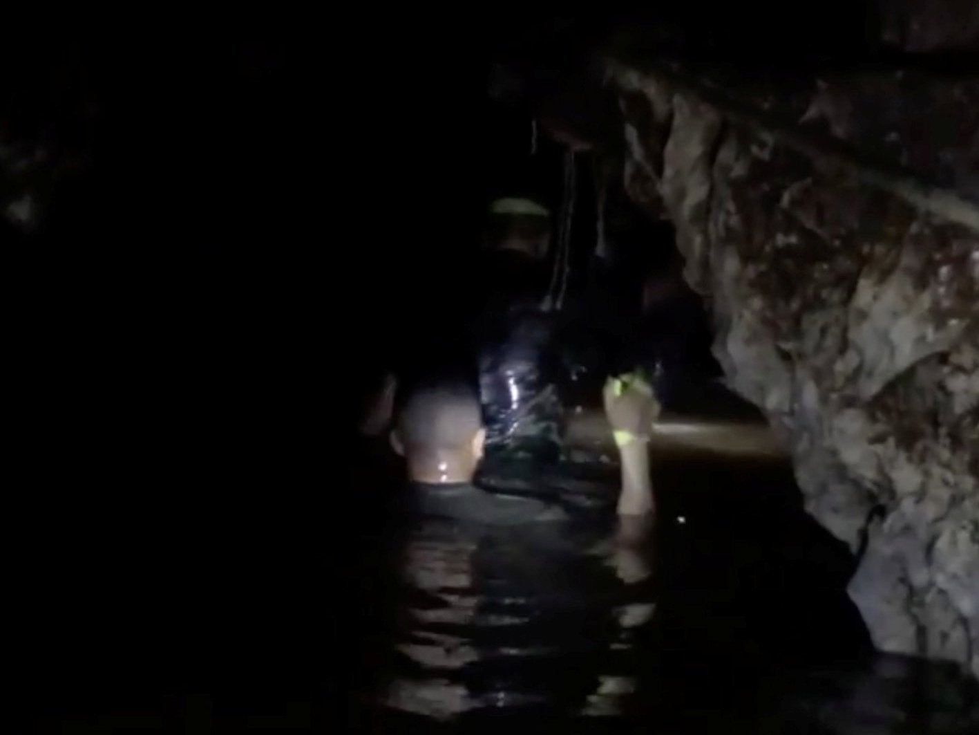 The Seals and volunteer divers painstakingly penetrated the cave, securing guidelines needed to ensure their safety (Reuters)