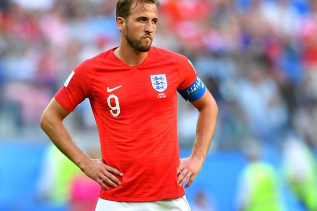 Harry Kane appears dejected after England's 2-0 defeat by Belgium