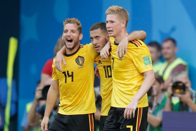 Eden Hazard celebrates with his Belgium teammates after scoring against England