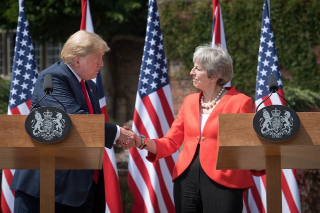 Theresa May and Donald Trump attend a joint press conference following their meeting at Chequers on 13 July 2018