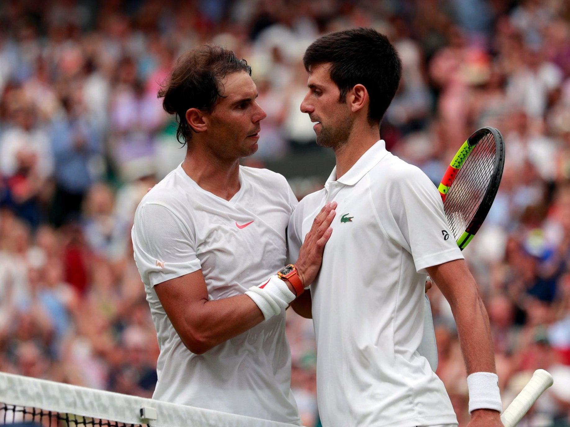 Rafael Nadal congratulates Novak Djokovic after their Wimbledon semi-final