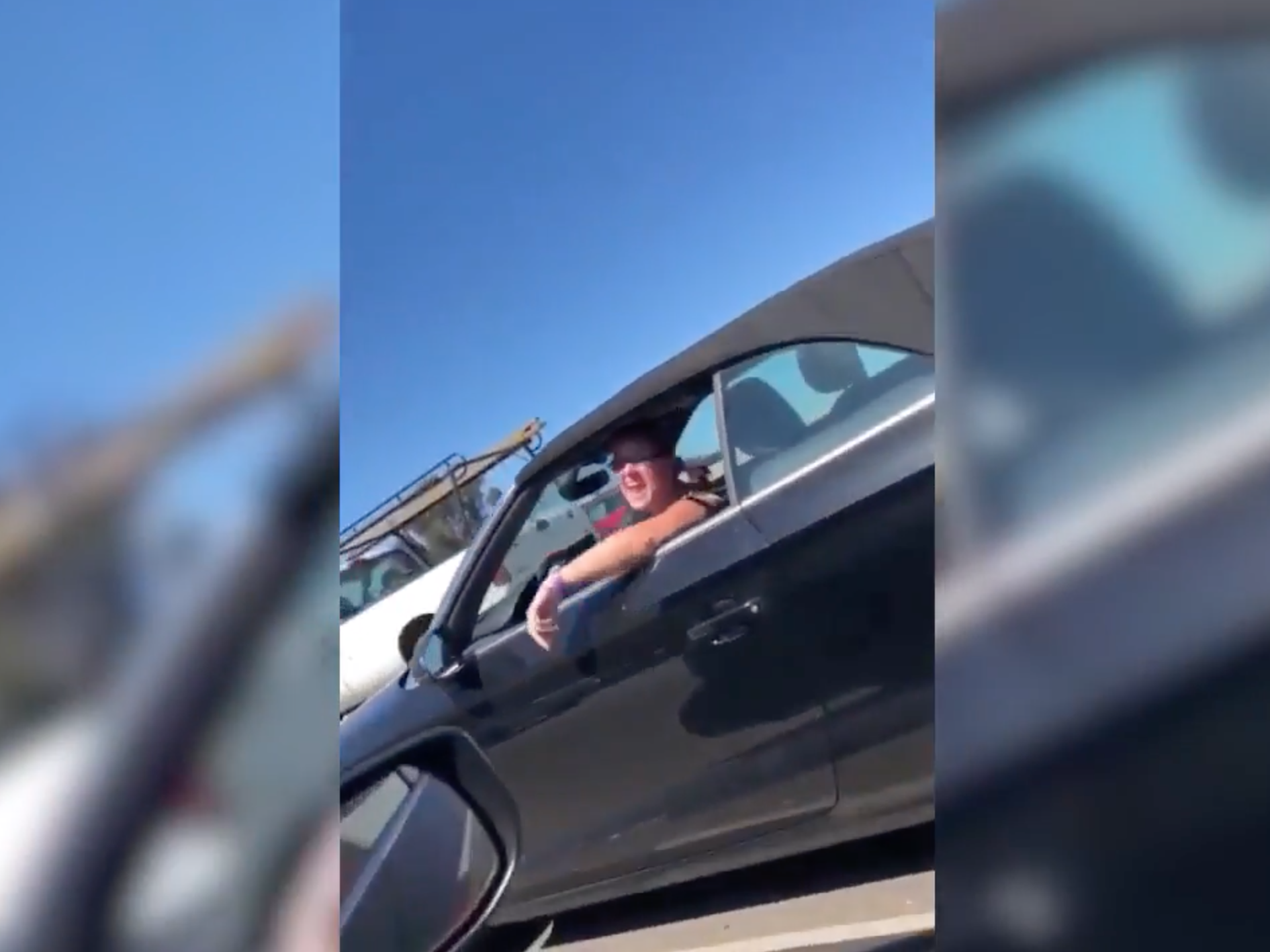 Woman fired after screaming racial slurs at black couple on California freeway