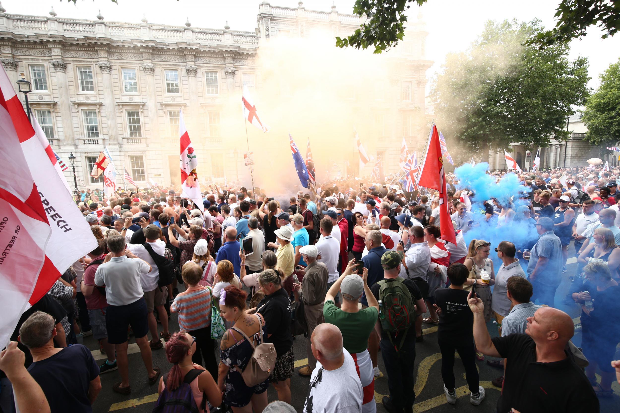 Free Tommy Robinson supporters and Pro-Trump supporters come together on Whitehall, London (PA)