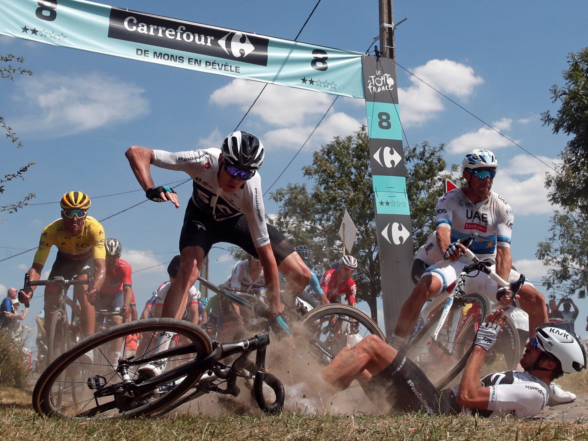 Chris Froome flies through the air in a crash during stage nine of the Tour de France