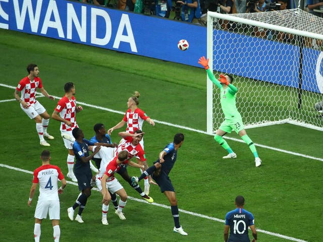 France's Antoine Griezmann scores their first goal