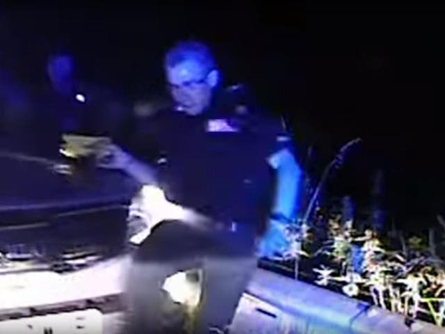 Dashcam shows the car hitting Sergeant Chris Schulze and knocking him along the roadside barrier.