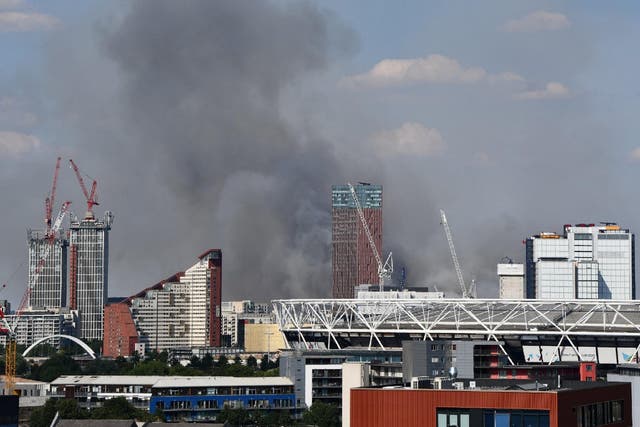 Plumes of thick smoke from the blaze can be seen over London