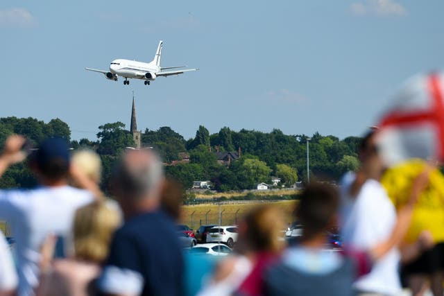 Some fans defied requests to stay away and watched the England team's plane land