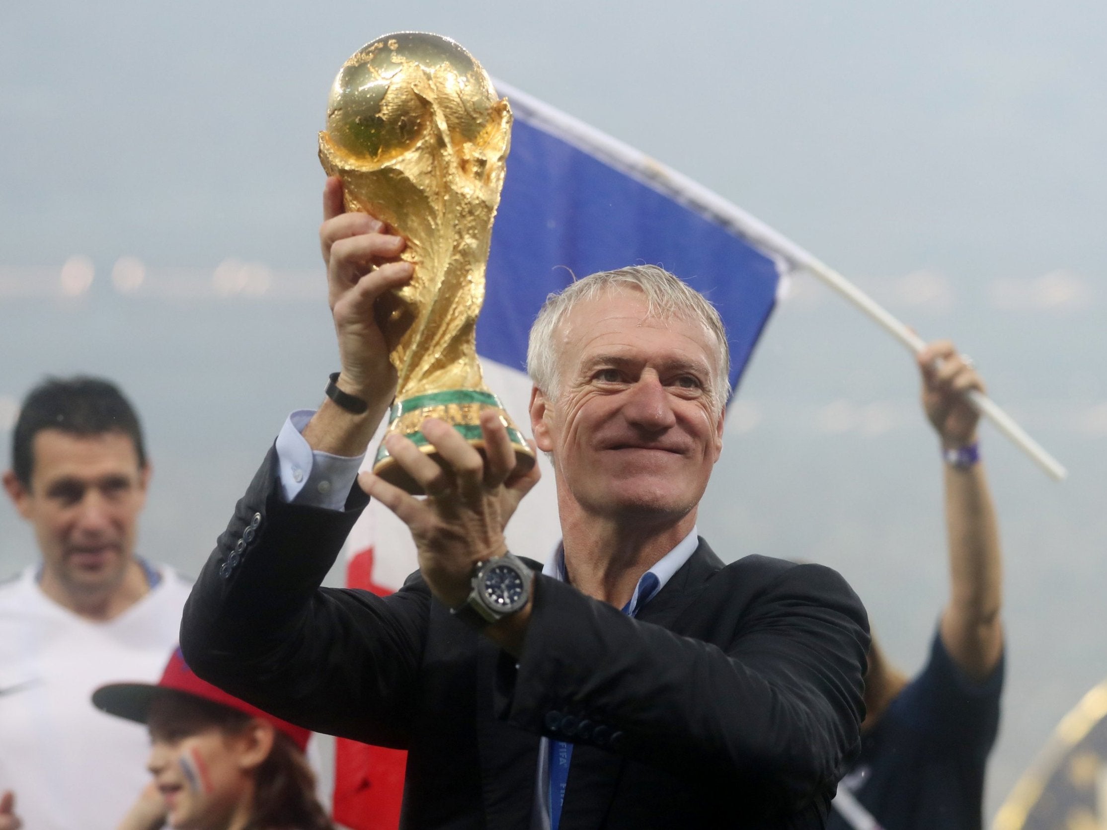 France coach Didier Deschamps celebrates with the trophy after winning the World Cup