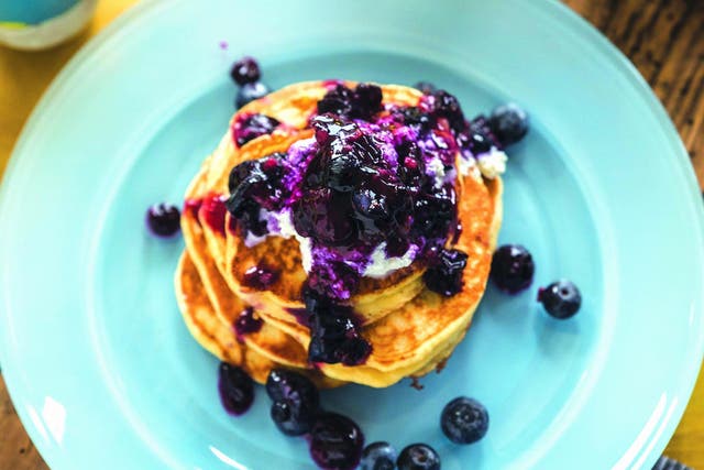 There is no better way to start the day than with fluffy pancakes and fresh blueberry compote