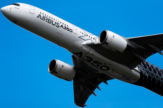 (FILES) In this file photo taken on July 14, 2016, an Airbus A350 XWB aircraft performs during a flying display at the Farnborough Airshow, south west of London. Aviation giant Airbus has warned it could pull out of Britain if it leaves the European Union without a deal, upping the pressure, June 22, 2018, on Prime Minister Theresa May to make progress in negotiations with Brussels. / AFP PHOTO / ADRIAN DENNISADRIAN DENNIS/AFP/Getty Images

ADRIAN DENNIS