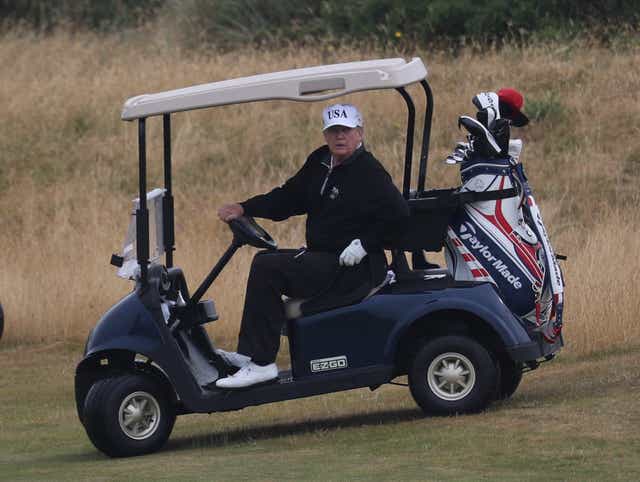 Related video: Donald Trump waves to screaming protesters at Turnberry in Scotland