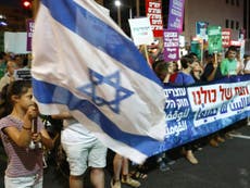 Thousands in Israel protest draft law that would ‘exclude’ Arabs