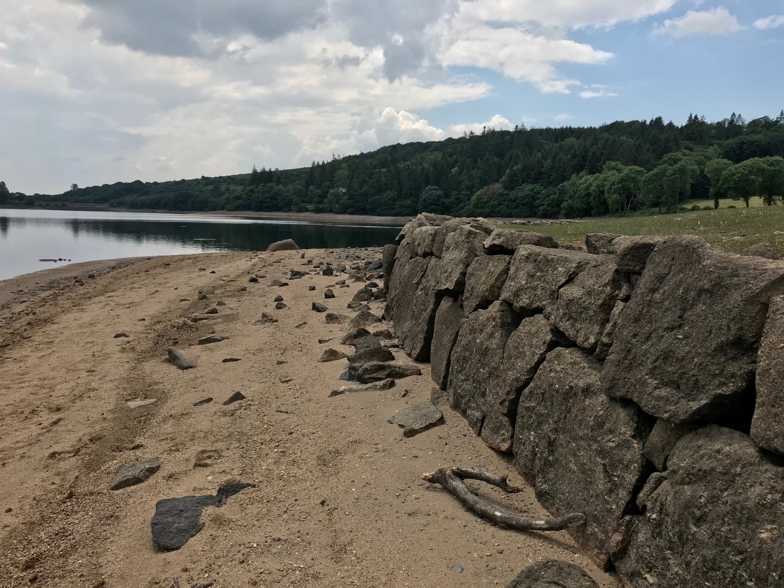 Hidden &apos;drowned village&apos; revealed after heatwave dries up reservoir