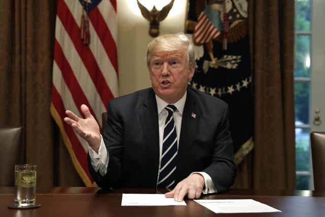 President Donald Trump speaks during a meeting with members of Congress in the Cabinet Room of the White House