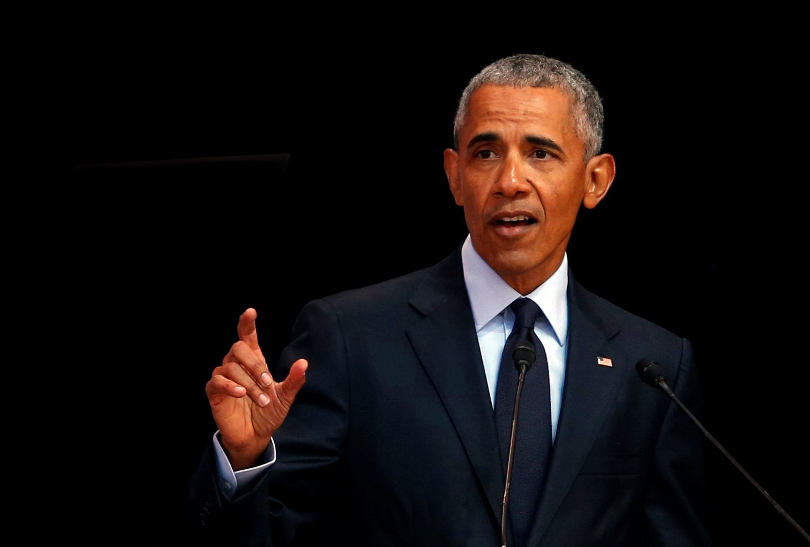 Former US president Barack Obama delivers the 16th Nelson Mandela annual lecture to mark the centenary of the anti-apartheid leader's birth, in Johannesburg, South Africa - 17 July 2018