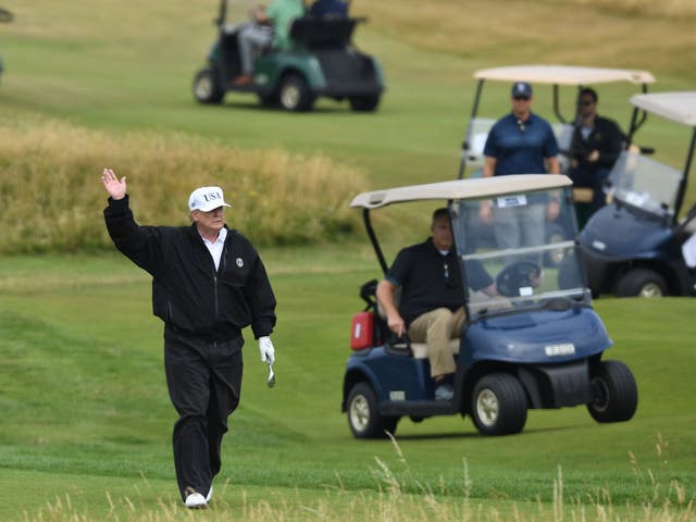Donald Trump golfs at his Turnberry resort
