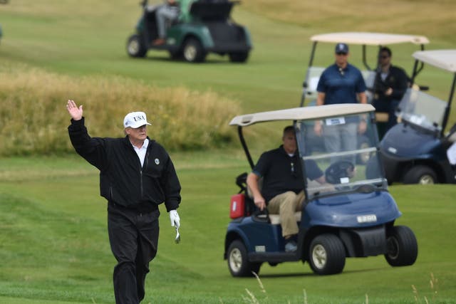 Donald Trump golfs at his Turnberry resort