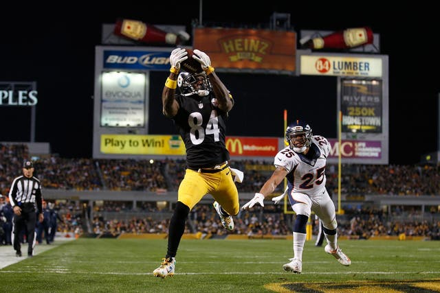 Antonio Brown #84 of the Pittsburgh Steelers catches a touchdown pass in the third quarter of the game against the Denver Broncos at Heinz Field on December 20, 2015 in Pittsburgh, Pennsylvania