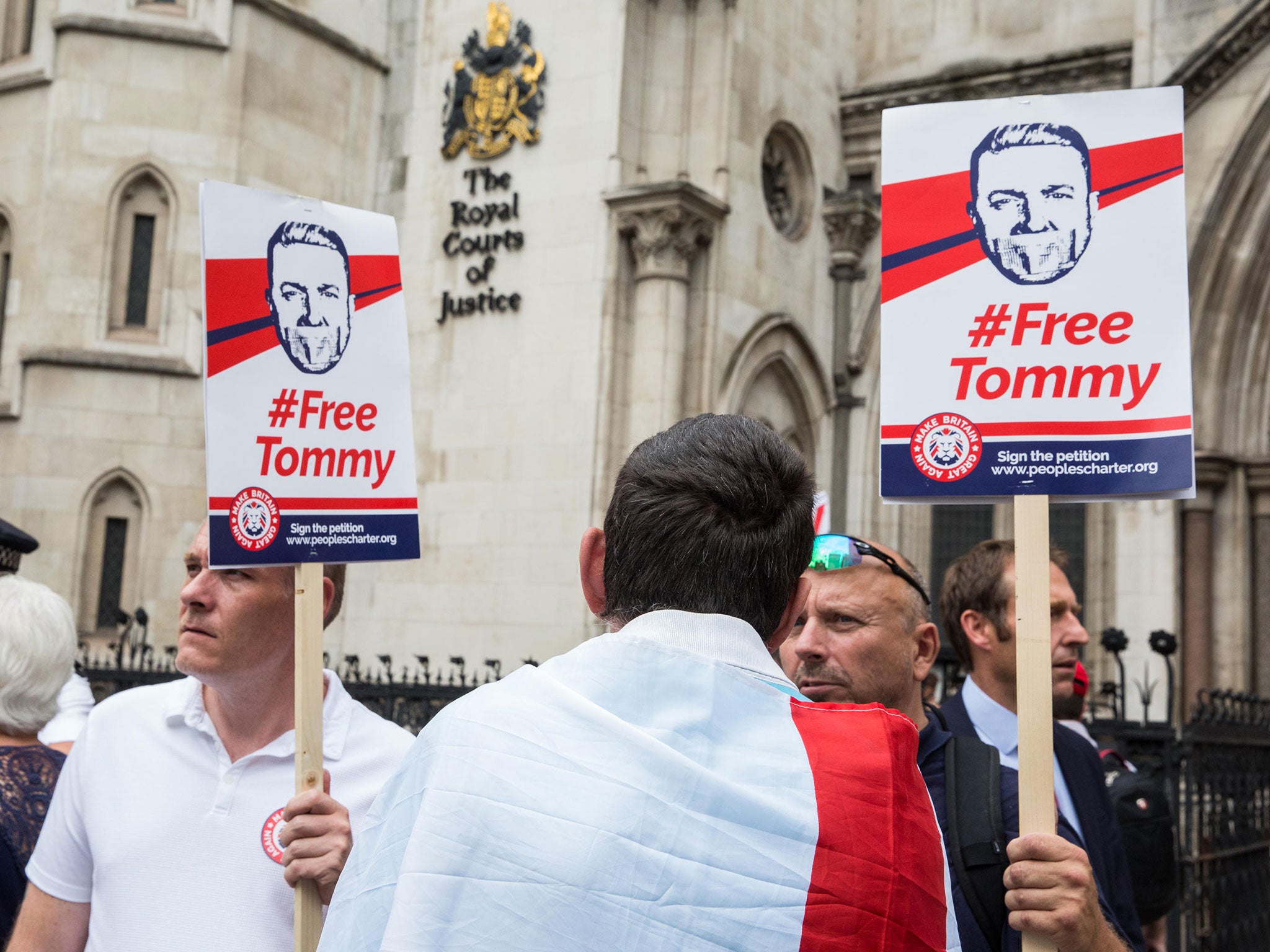 Free Tommy protesters outside the Court of Appeal during a hearing on Tommy Robinson's 13-month prison sentence on 18 July