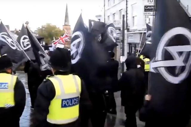 Members of the far-right group National Action marching through Darlington and performing Nazi salutes in November 2016