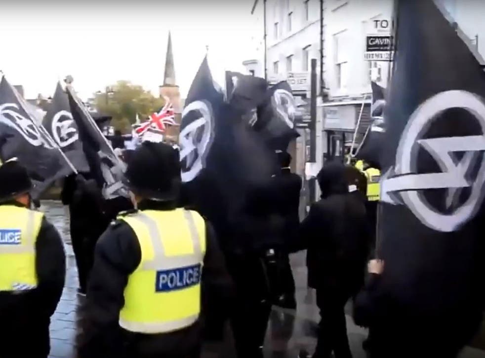 Members of the far-right group National Action marching through Darlington and performing Nazi salutes in November 2016