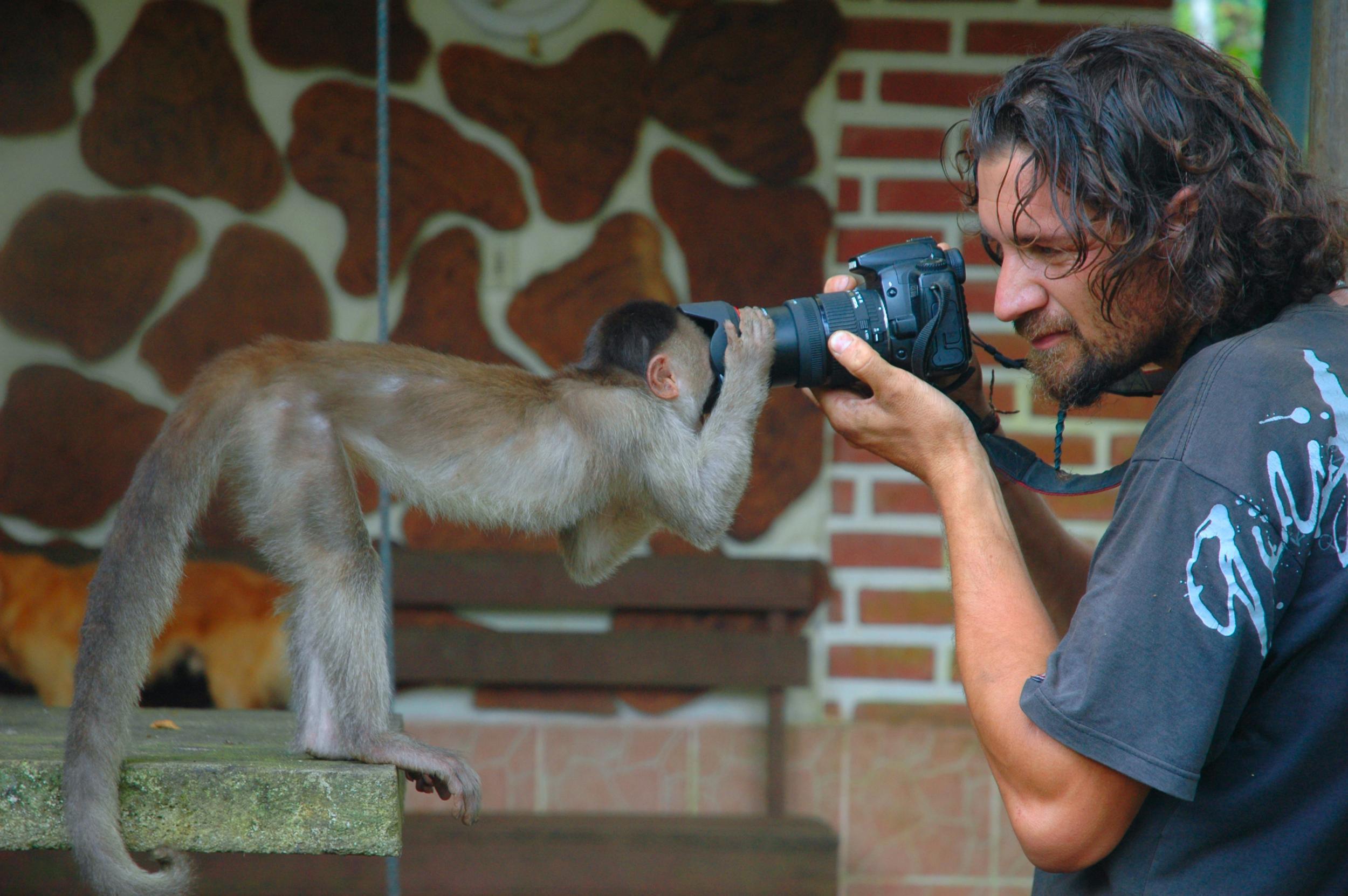 The pair make a little extra money by teaching photography