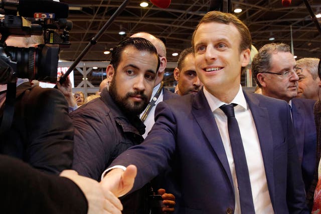 Then-French presidential candidate Emmanuel Macron pictured with bodyguard Alexandre Benalla in 2017