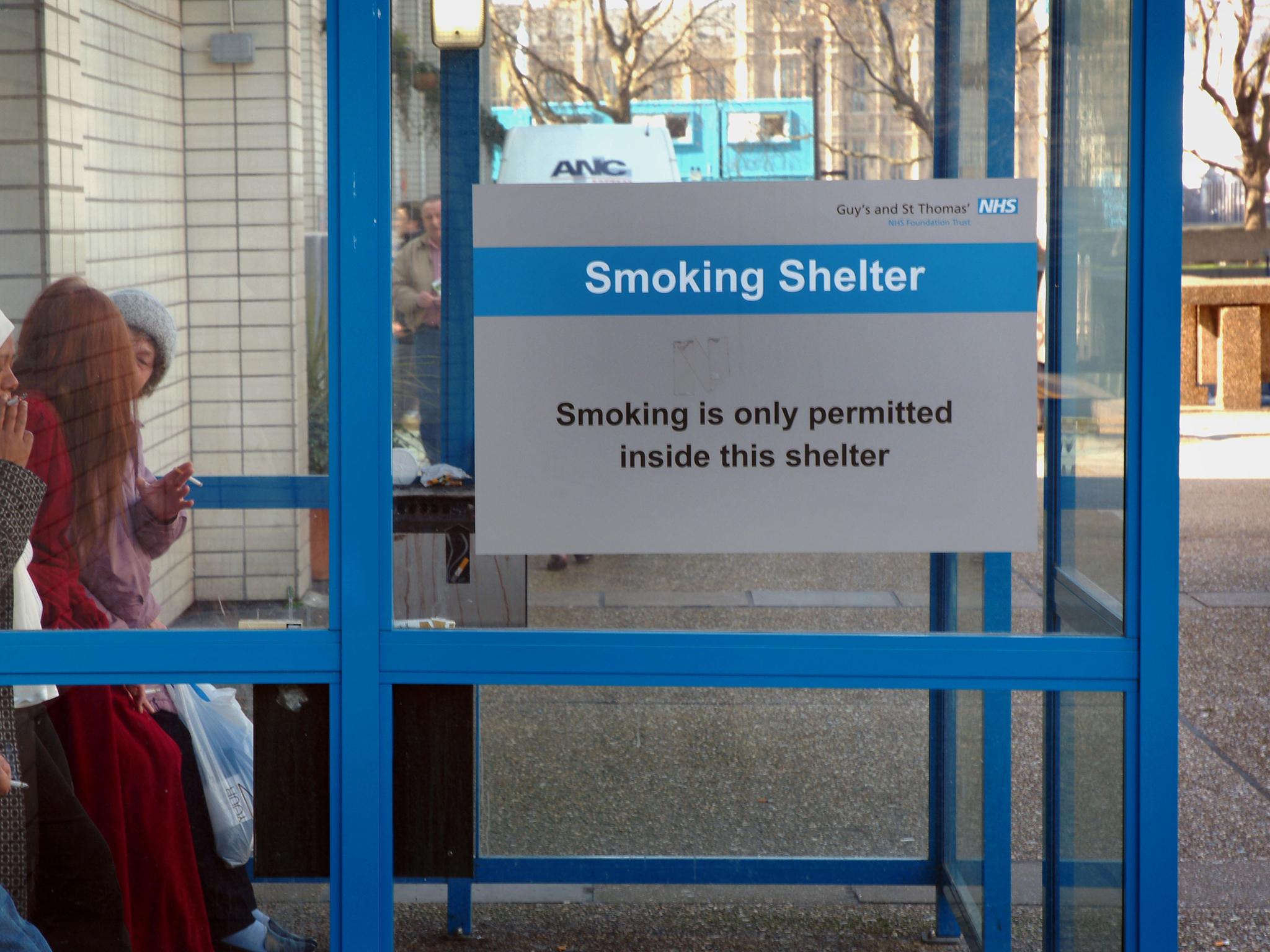 Some NHS sites have smoking shelters, but new legislation will eliminate cigarette sales
