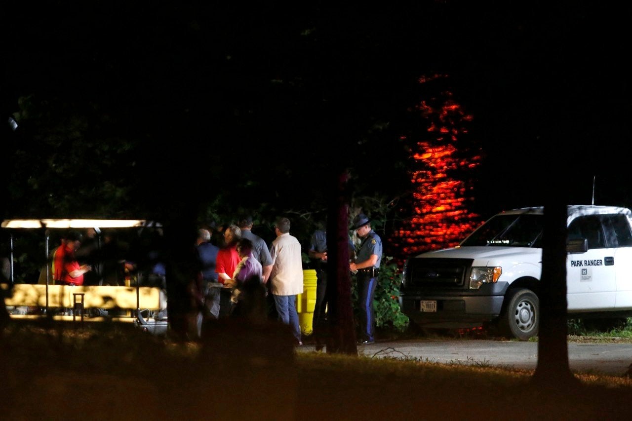 Rescue crews work by the shore of Table Rock Lake